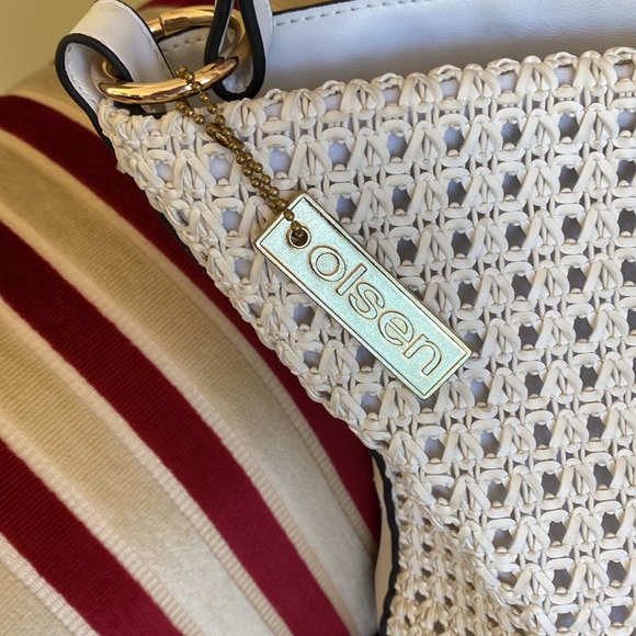 Olsen Bag.  Beautiful detail in front and amazing bag.  Lots of storage inside. - Picture 2 of 7